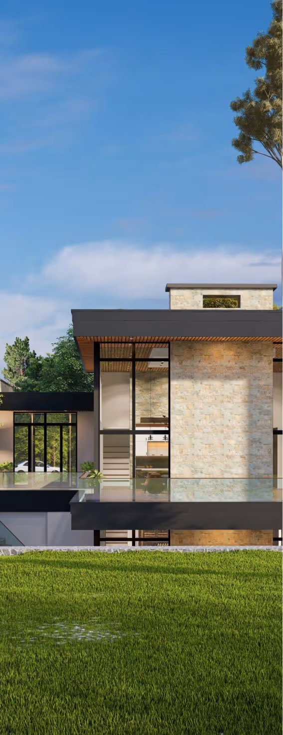 Casa moderna de dois andares com grandes janelas de vidro, paredes de pedra e telhado preto, cercada por gramado verde e árvores sob céu azul.
